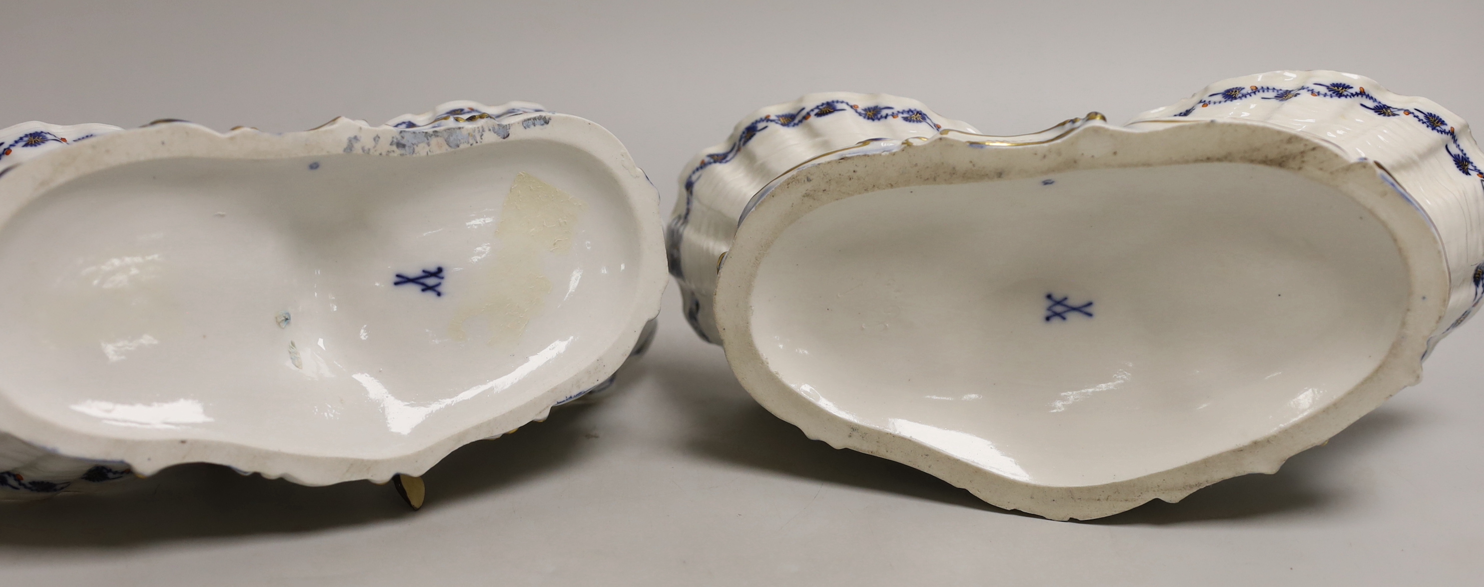 A pair of late 19th century Meissen figural sweetmeat dishes, 24.5cm wide